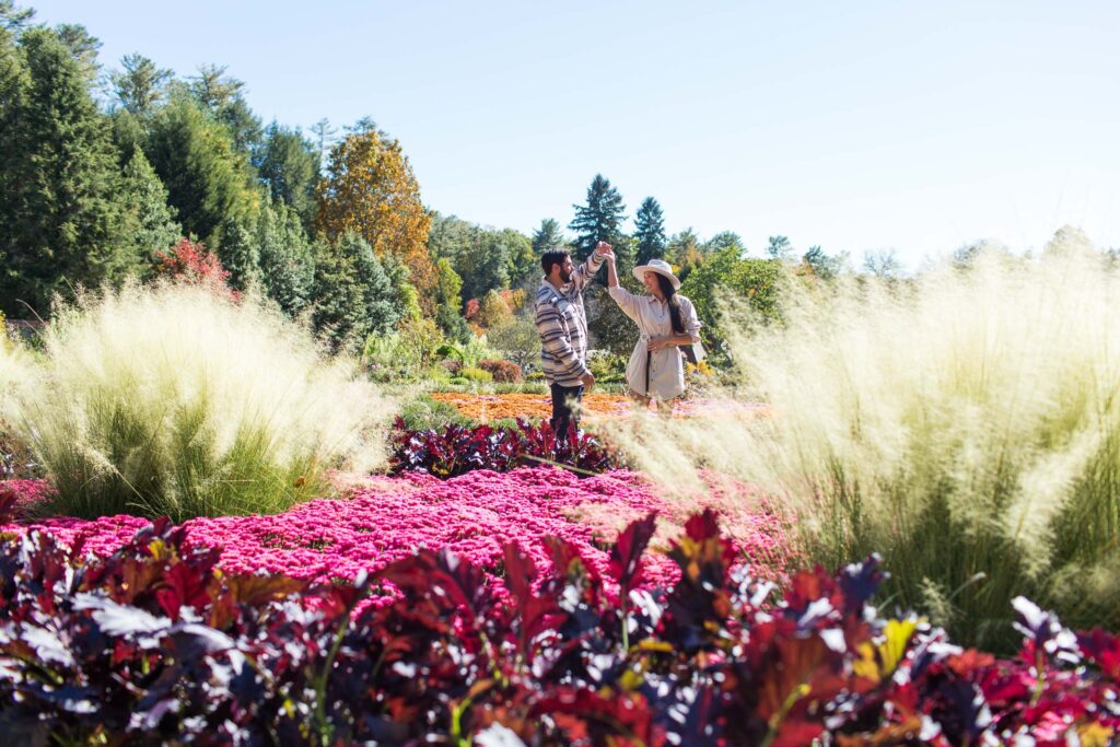couple dances in the gardens at the biltmore estate 