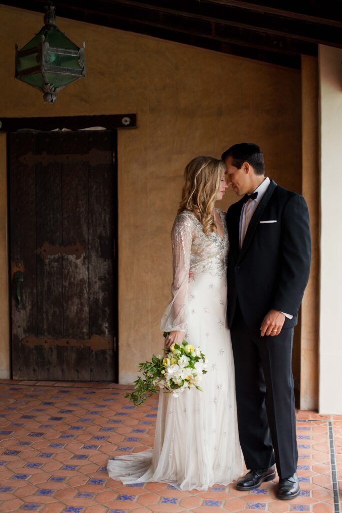 wedding couple in the pool house at the adamson house in malibu