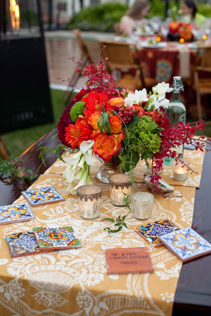 vibrant unique table decor wedding florals at the adamson house in malibu