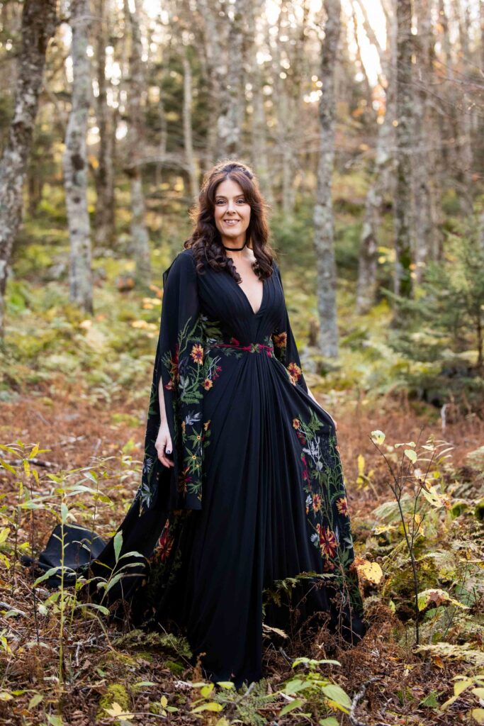 grayson highlands elopement with unique bridal style with black wedding gown with nature inspired flowers and greenery embroidered on her dress