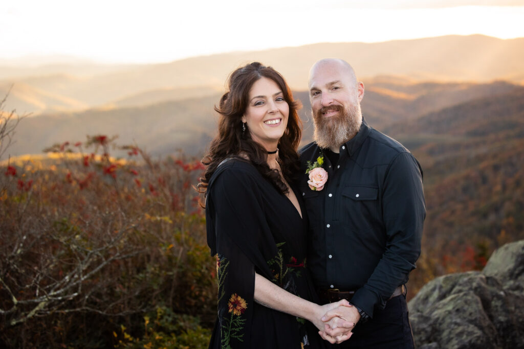 bride and groom wearing all black nature-inspired wedding attire during their grayson highlands elopement