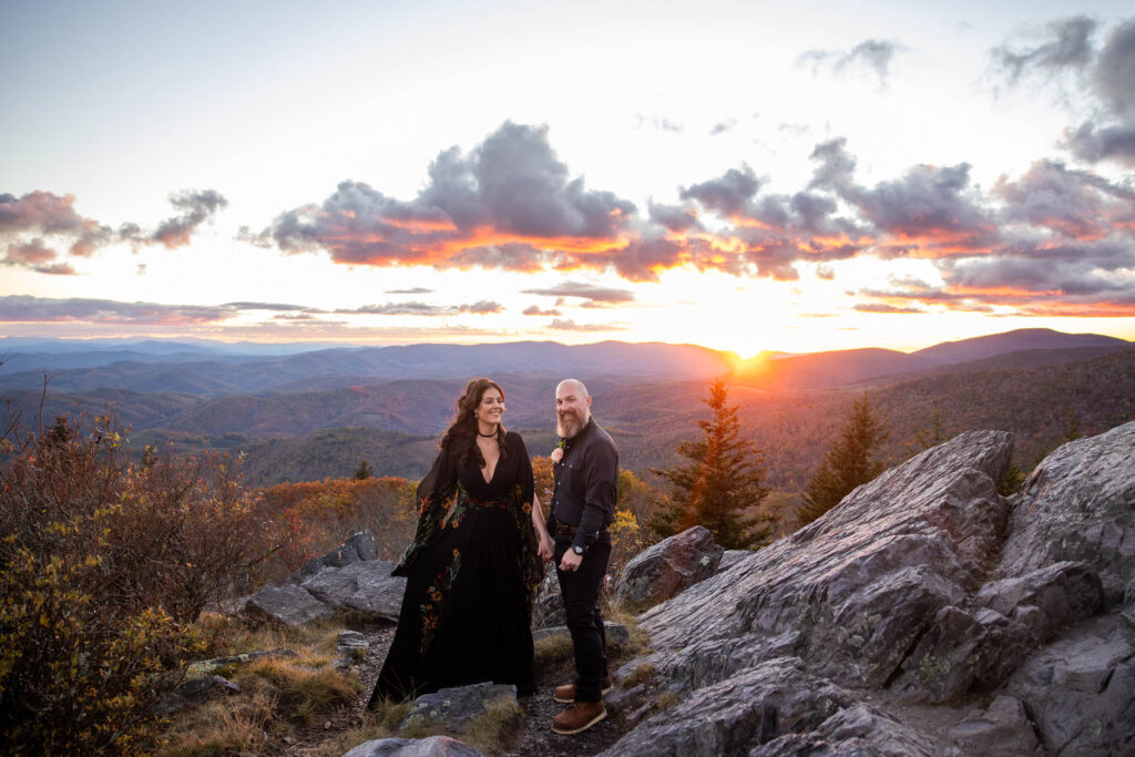 bride and groom in all black at sunset during their VA elopement at Twin Pinnacles in Grayson Highlands