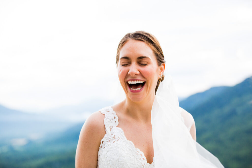 bride filled with joy, laughing on her wedding day