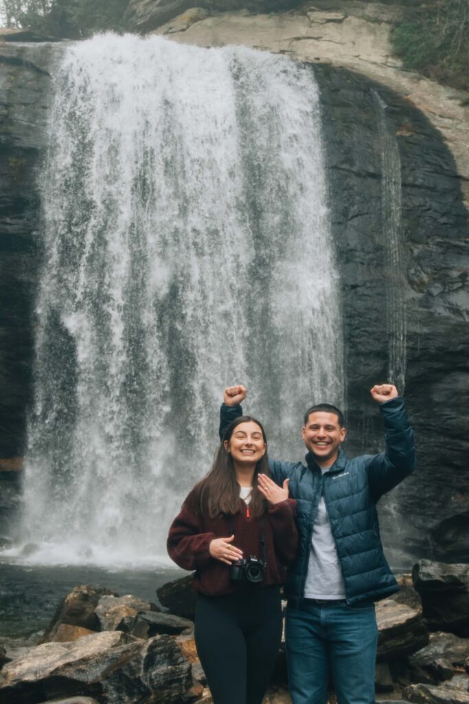 Surprise marriage proposal at Looking Glass Falls in Pisgah National Forest near Brevard, North Carolina