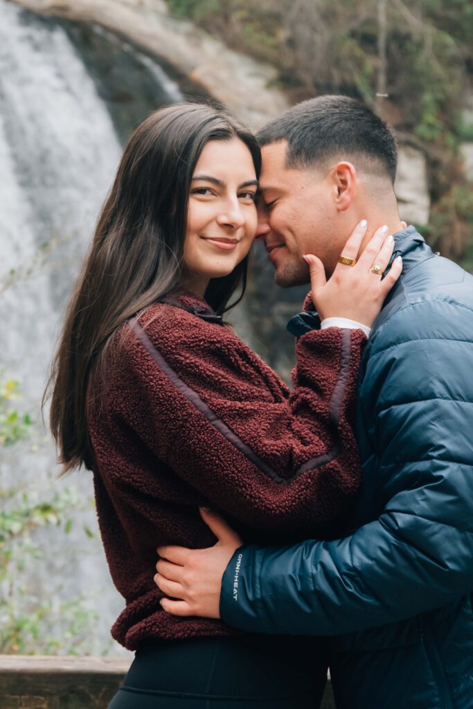 Surprise marriage proposal at Looking Glass Falls in Pisgah National Forest near Brevard, North Carolina