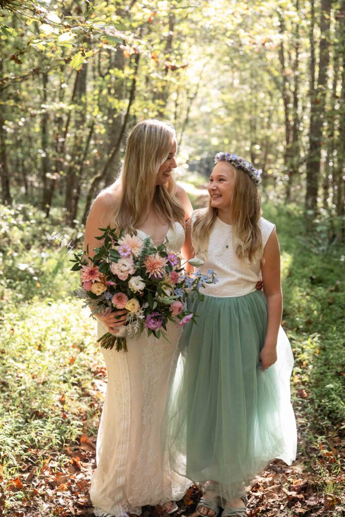 Bride and daughter portraits at Elopement with a child at Pilot Mountain State Park in the North Carolina foothills