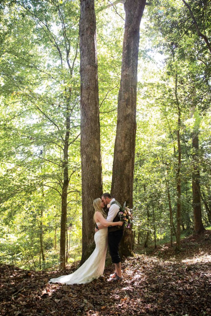 Bride and groom portraits during a Pilot Mountain State Park elopement surrounded by trees