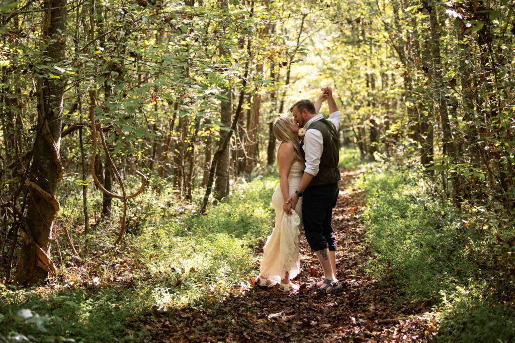 Couple hiking together during their Pilot Mountain State Park elopement in North Carolina