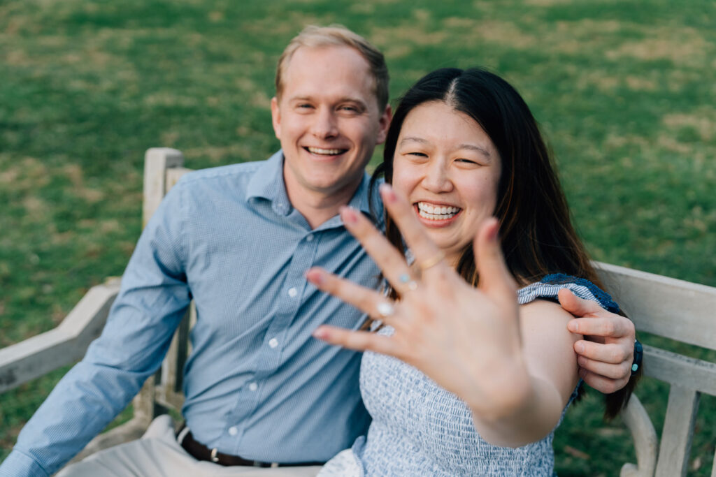 woman shows off her engagement ring after her boyfriend proposed to her at the graylyn estate in winston-salem, nc
