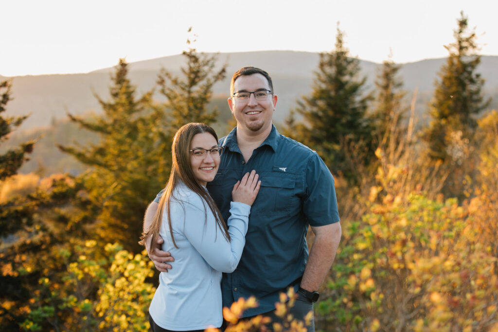 couple smiles after their proposal at grayson highlands