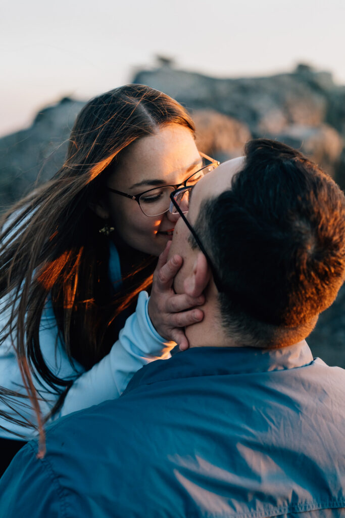man proposes to his girlfriend at Grayson Highlands State Park in VA