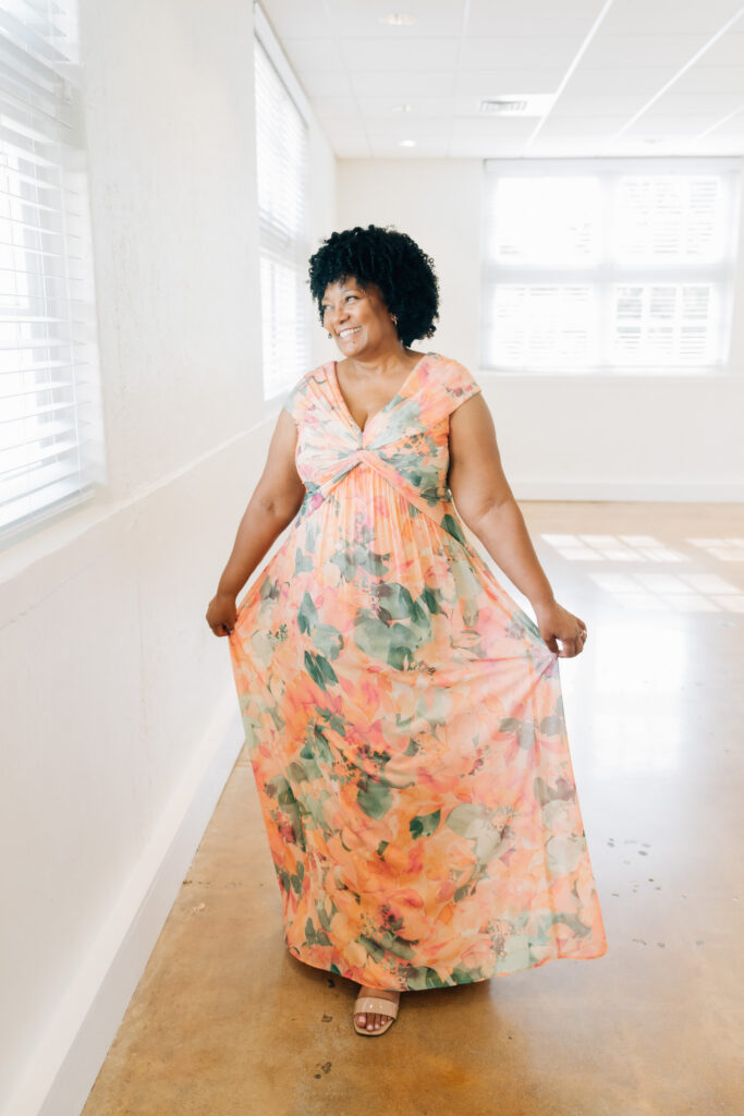 woman shows off her gown during her nc vow renewal at the barn at reynolda in winston-salem, nc