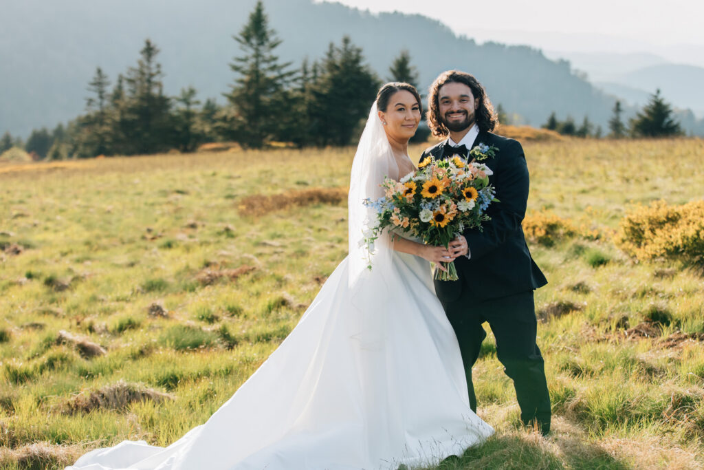 happy couple smiling after their carver's gap elopement in north carolina