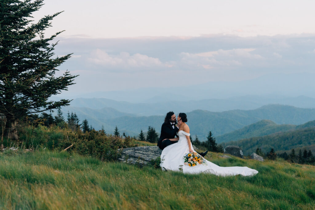 couple has a private moment during their elopement at carver's gap in the roan highlands