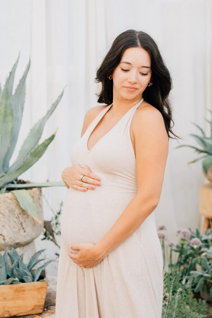 pregnant mom at fleurish greenhouse