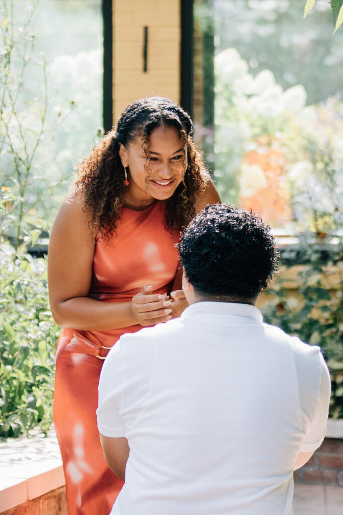 surprise proposal at the greensboro science center in the butterfly house