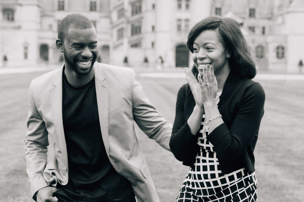 couple laughs and smiles together after their surprise proposal at the biltmore estate