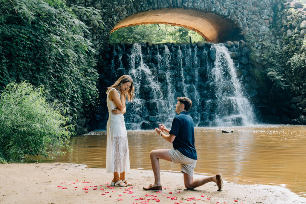 proposal in front of a nc waterfall in winston-salem