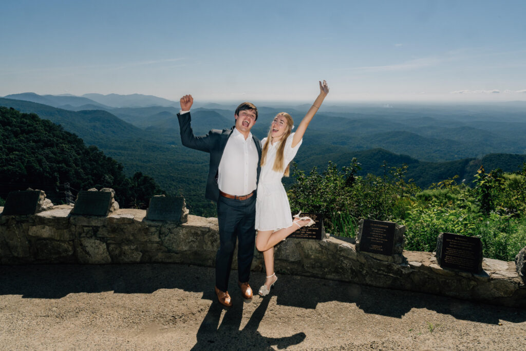 couple cheers to celebrate their surprise proposal at symmes chapel